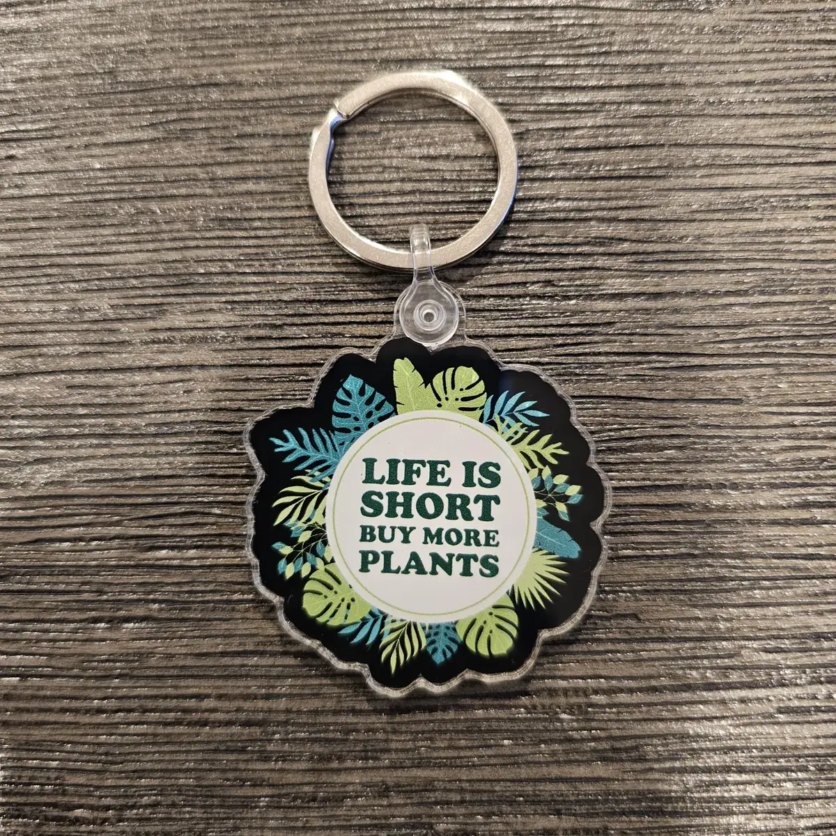 Life Is Short Buy More Plants Fun Foliage Acrylic Keychain 2in x 2in - Image 1