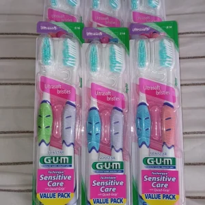 Sensitive Care Toothbrush with Quad-Grip Handle, Ultra Soft Bristles - Image 1